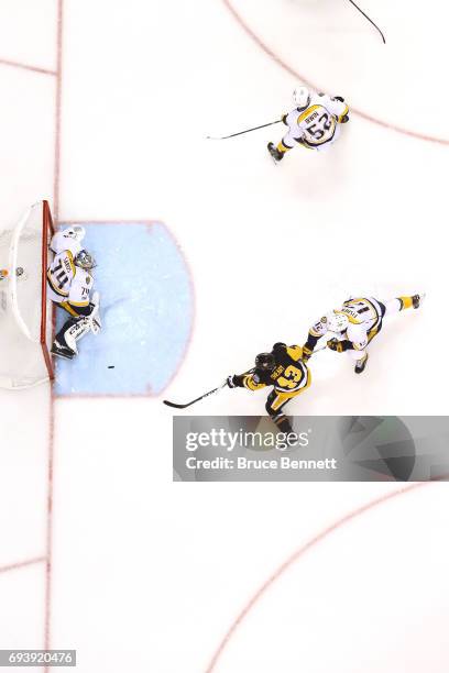 Conor Sheary of the Pittsburgh Penguins celebrates scoring his team's fourth goal against the Nashville Predators in the second period in Game Five...