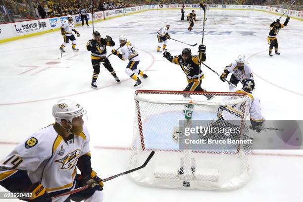 Conor Sheary of the Pittsburgh Penguins celebrates scoring his team's fourth goal against the Nashville Predators in the second period in Game Five...