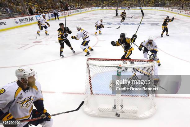 Conor Sheary of the Pittsburgh Penguins celebrates scoring his team's fourth goal against the Nashville Predators in the second period in Game Five...
