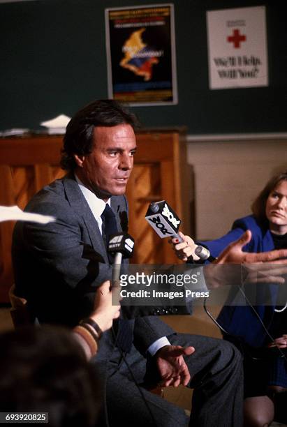 Julio Iglesias speaks to the Press during a Telethon for Colombia circa 1985 in New York City.