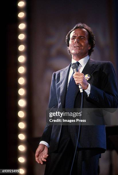 Julio Iglesias on stage during a Telethon for Colombia circa 1985 in New York City.