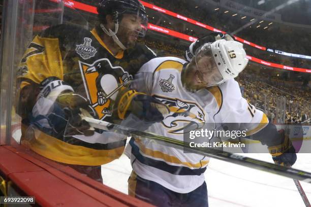 Calle Jarnkrok of the Nashville Predators collides with Matt Cullen of the Pittsburgh Penguins in the second period in Game Five of the 2017 NHL...