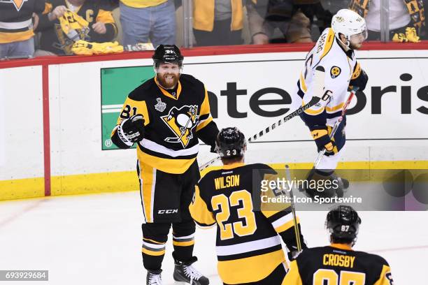 Pittsburgh Penguins right wing Phil Kessel celebrates his goal with center Scott Wilson during the second period in Game Five of the 2017 NHL Stanley...