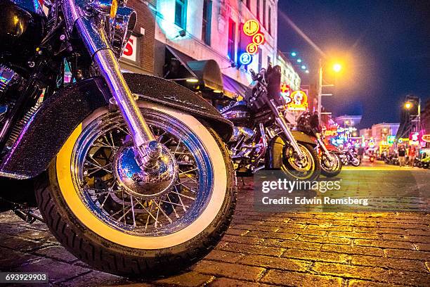 bikes on the street - entertainment club stock pictures, royalty-free photos & images