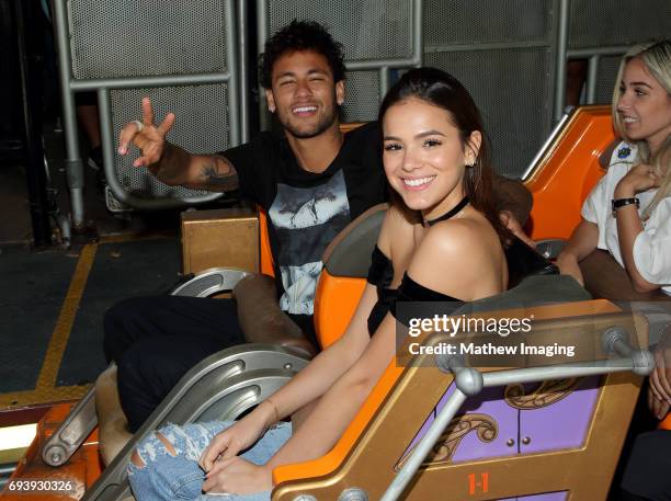 Athlete Neymar Jr. And actor Bruna Marquezine ride Twisted Colossus at Six Flags Magic Mountain on June 8, 2017 in Valencia, California.