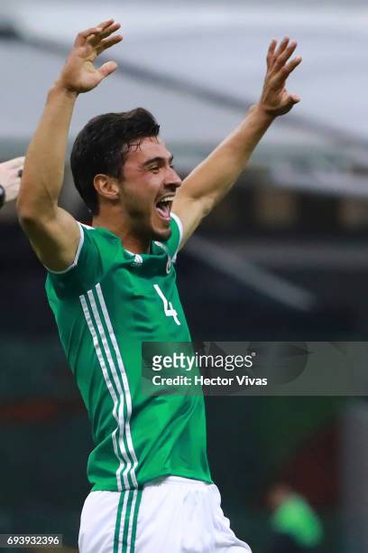 Oswaldo Alanis of Mexico celebrates after scoring the first goal of his team during the match between Mexico and Honduras as part of the FIFA 2018...
