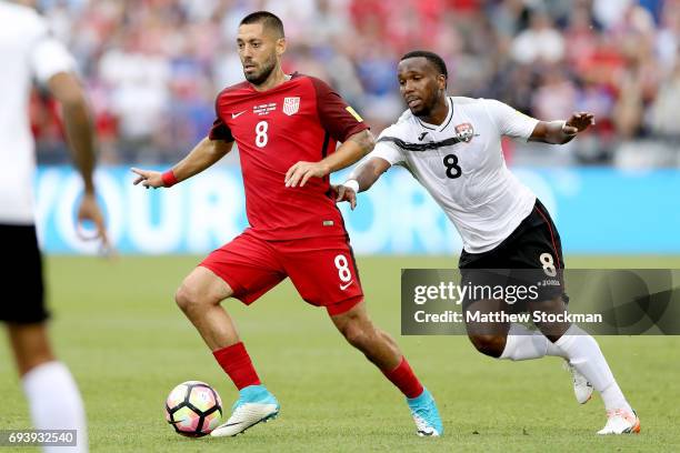 Clint Dempsey of the U.S. National Team advances the ball against Khaleem Hyland of Trinidad & Tabago in the first half during the FIFA 2018 World...