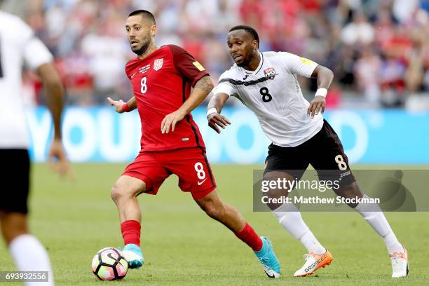 Clint Dempsey of the U.S. National Team advances the ball against Khaleem Hyland of Trinidad & Tabago in the first half during the FIFA 2018 World...