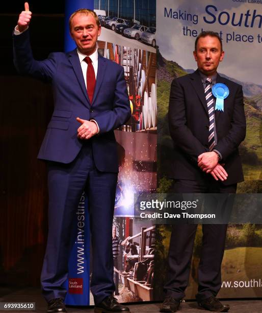 Leader of the Liberal democrats Tim Farron celebrates beating Conservative party candidate James Airey following the announcement of the results at...