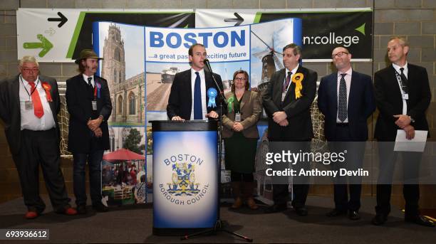 Leader Paul Nuttall listens as winning candidate Conservative Matt Warman speaks out by the Returning Officer following the vote count for the...
