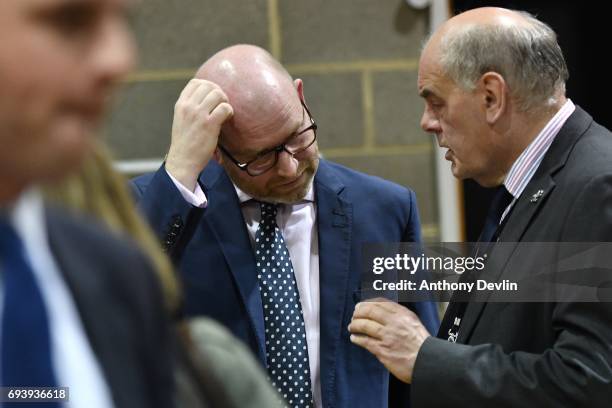 Leader Paul Nuttall reacts as he speaks to a party member following the vote count for the constituency of Boston and Skegness on June 9, 2017 in...