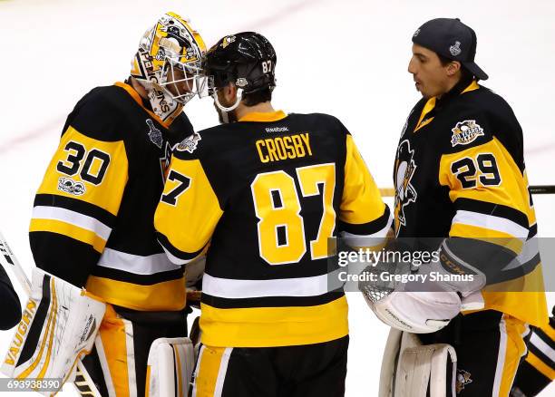 Matt Murray of the Pittsburgh Penguins celebrates with Sidney Crosby after defeating the Nashville Predators in Game Five of the 2017 NHL Stanley Cup...