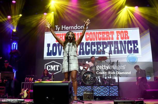 Singer-songwriter Mickey Guyton performs onstage during the 2017 Concert for Love & Acceptance on June 8, 2017 in Nashville, Tennessee.
