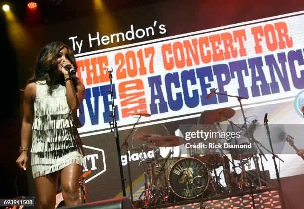 Singer-songwriter Mickey Guyton performs onstage during the 2017 Concert for Love & Acceptance on June 8, 2017 in Nashville, Tennessee.