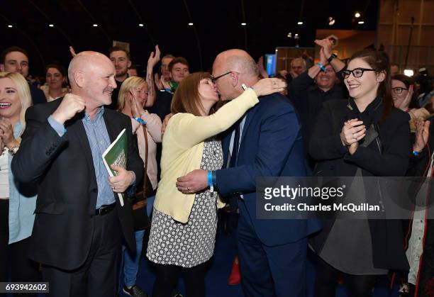 Sinn Fein candidate Paul Maskey celebrates after winning the west Belfast seat at the Belfast count taking place at the Titanic exhibition centre on...