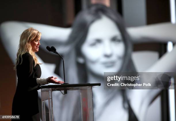 Actor Reese Witherspoon speaks onstage during American Film Institute's 45th Life Achievement Award Gala Tribute to Diane Keaton at Dolby Theatre on...
