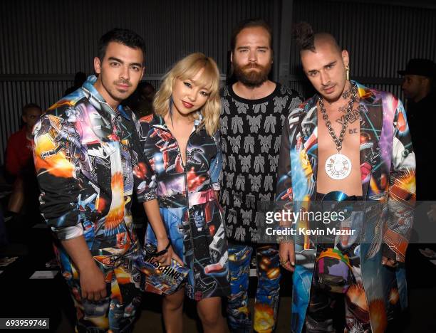 Musicians Joe Jonas, JinJoo Lee, Jack Lawless and Cole Whittle of DNCE attend Moschino Spring/Summer 18 Menswear and Women's Resort Collection at...