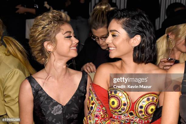 Actors Sarah Hyland and Vanessa Hudgens attend Moschino Spring/Summer 18 Menswear and Women's Resort Collection at Milk Studios on June 8, 2017 in...