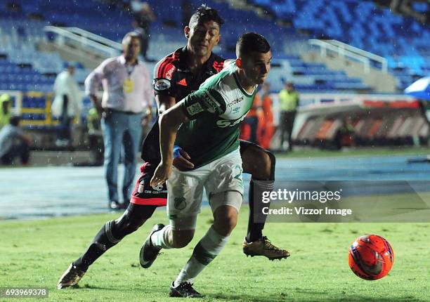 Eder Castaneda of America Cali struggles the ball with Nicolas Benedetti of Deportivo Cali during the match between America de Cali and Deportivo...