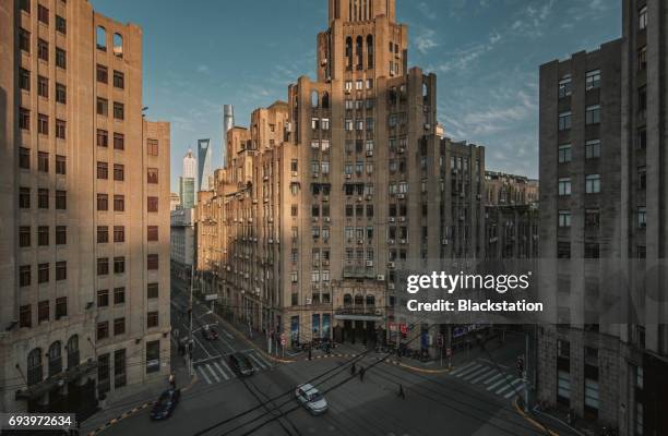 historical buildings in shanghai - peace hotel shanghai stock pictures, royalty-free photos & images