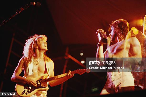 Guitarist Donnie Dacus and singer and trombonist James Pankow performing with American rock group Chicago, USA, September 1978.