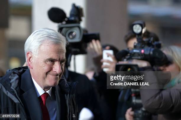 Britain's opposition Labour party's Shadow Chancellor of the Exchequer John McDonnell arrives at Labour Party headquarters in central London on June...