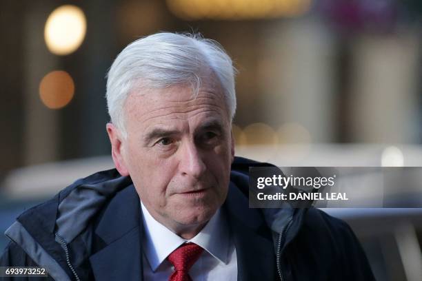 Britain's opposition Labour party's Shadow Chancellor of the Exchequer John McDonnell arrives at Labour Party headquarters in central London on June...