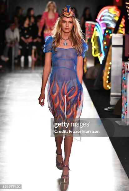 Model Stella Maxwell walks the runway at Moschino Spring/Summer 18 Menswear and Women's Resort Collection at Milk Studios on June 8, 2017 in...