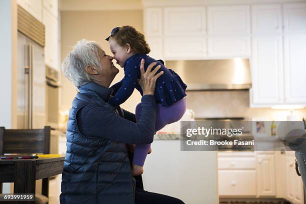 grandmother and grandaughter - grandmother imagens e fotografias de stock