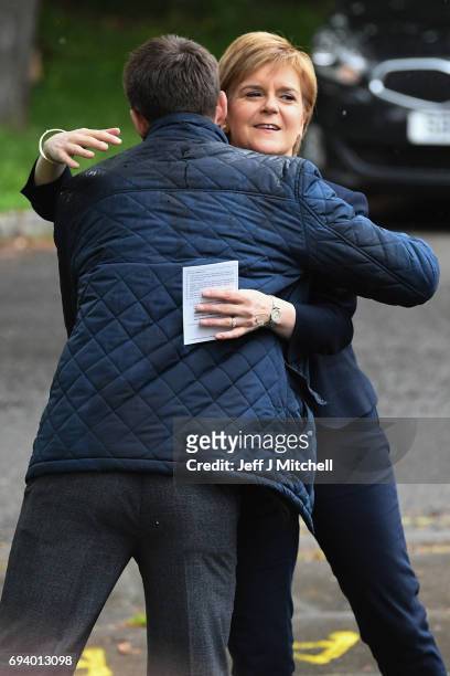 Leader Nicola Sturgeon arriving to cast her vote in the general election with her husband Peter Murrel at Broomhouse Community Hall on June 8, 2017...