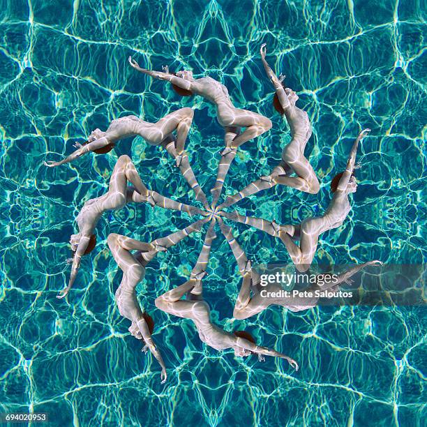 multiple exposure of caucasian woman swimming in spiral - synchronized swimming stock pictures, royalty-free photos & images