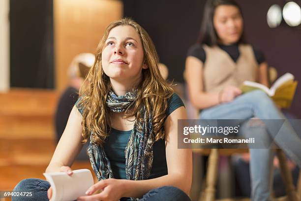 curious mixed race teenage girl in theater class - teenager dream work stock pictures, royalty-free photos & images