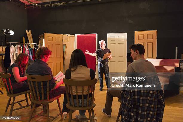 teacher talking to students in theater class - best actor imagens e fotografias de stock