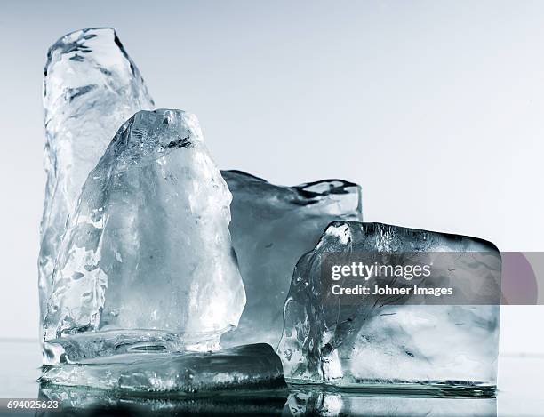 ice cubes, close-up - iceberg ice formation stock pictures, royalty-free photos & images