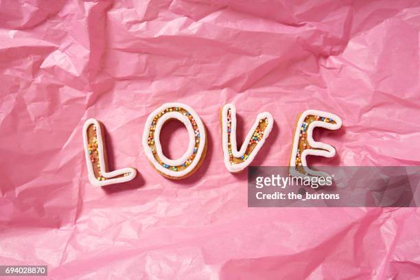 high angle view of homemade cookies, spell love - alcorza fotografías e imágenes de stock