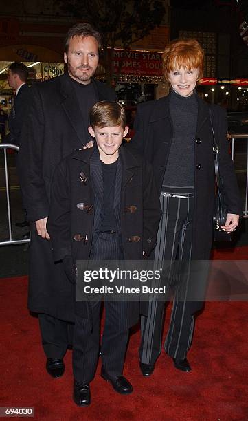 Singer and actress Reba McEntire, husband Narvel Blackstock, and son Shelby attend the premiere of the film "A Walk To Remember" January 23, 2002 at...