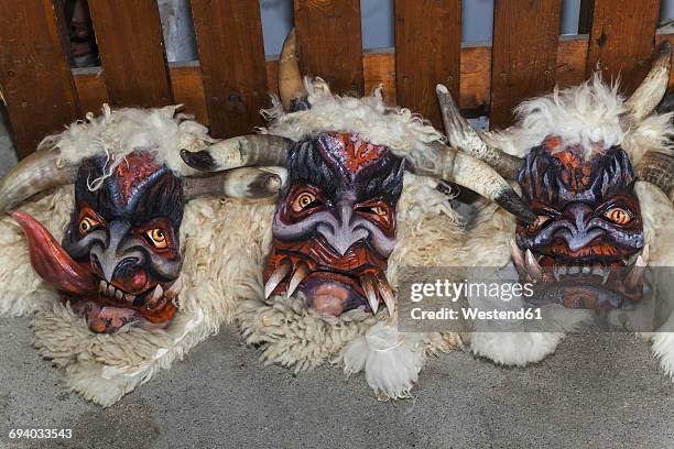 handcrafted wooden krampus masks - krampus stock pictures, royalty-free photos & images