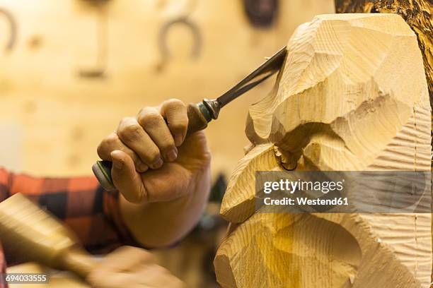 wood carver manufacturing traditional krampus mask - sculptor stock pictures, royalty-free photos & images