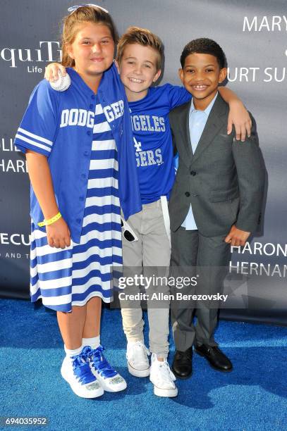 Actors Mackenzie Hancsicsak, Parker Bates and Lonnie Chavis attend Los Angeles Dodgers Foundation's 3rd Annual Blue Diamond Gala at Dodger Stadium on...