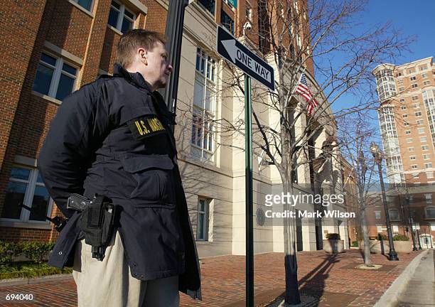 Marshall stands guard in front of the Federal Court House January 22, 2002 where American Taliban fighter John Walker Lindh will go on trial in...