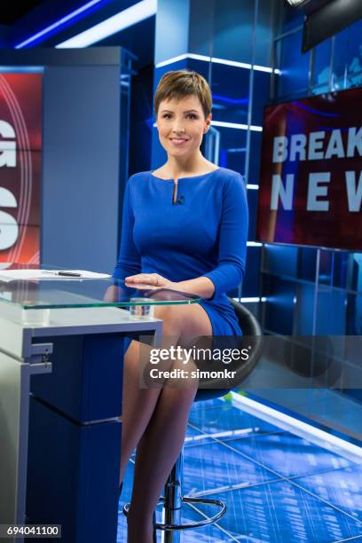newsreader in television studio - vertical tv stock pictures, royalty-free photos & images