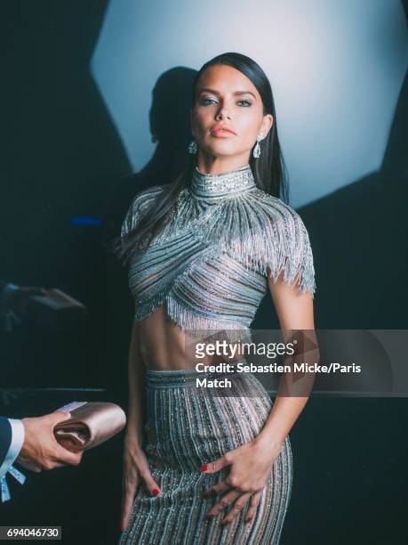 Fashion model Adriana Lima wearing a Chopard dress is photographed for Paris Match on May 19, 2017 in Cannes, France.