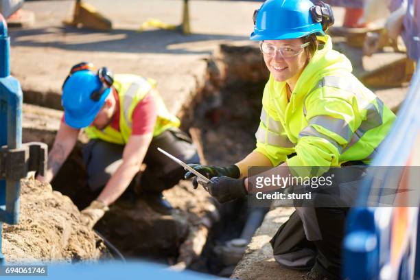 female gas ananlyst - trench stock pictures, royalty-free photos & images