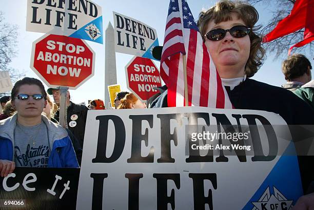 Pro-life activists Lori Gordon and Tammie Miller of Payne, OH take part in the annual "March for Life" event January 22, 2002 in Washington, DC....