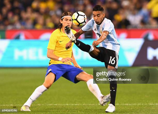 Jose Luis Gomez of Argentina passes the ball during the Brazil Global Tour match between Brazil and Argentina at Melbourne Cricket Ground on June 9,...