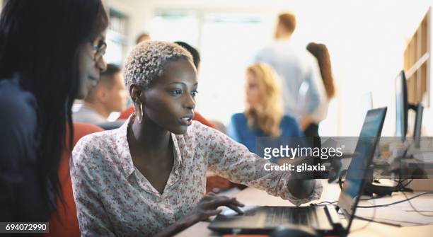 graphic designers at work. - showing stock pictures, royalty-free photos & images