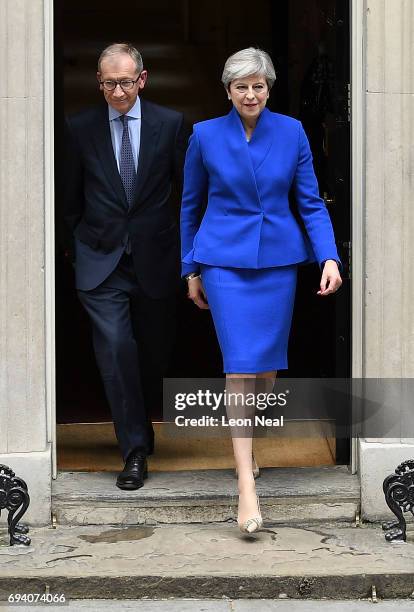 Prime Minister Theresa May leaves Downing Street with her husband Philip to go to Buckingham Palace where she will seek the Queen's permission to...