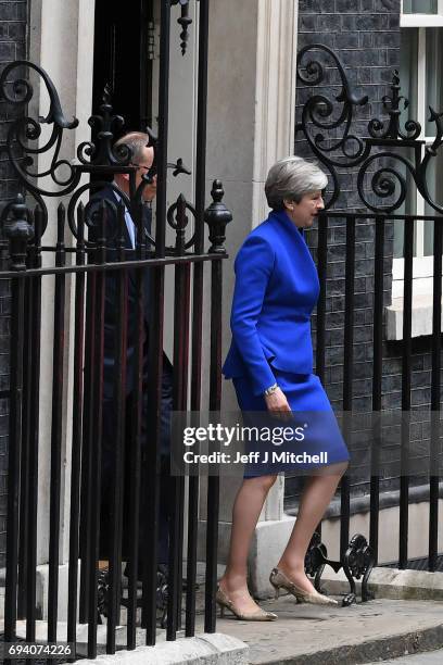 Prime Minister Theresa May leaves Downing Street with her husband Philip to go to Buckingham Palace where she will seek the Queen's permission to...