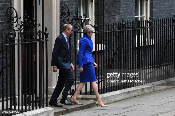 Prime Minister Theresa May leaves Downing Street with her husband Philip to go to Buckingham Palace where she will seek the Queen's permission to...