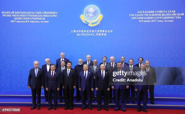 Secretary General Rashid Alimov, Uzbekistan's President Shavkat Mirziyoyev, China's President Xi Jinping, Kazakhstan's President Nursultan...